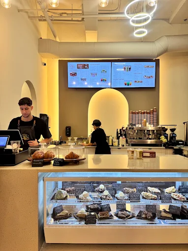 The Shaghf team behind the pastry and coffee counter
